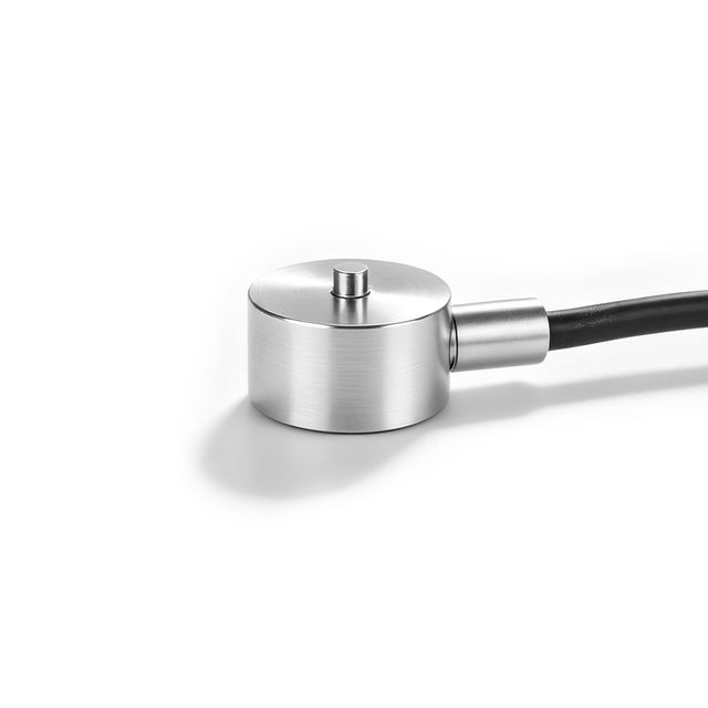Kraftsensor for minibelastningsknapp